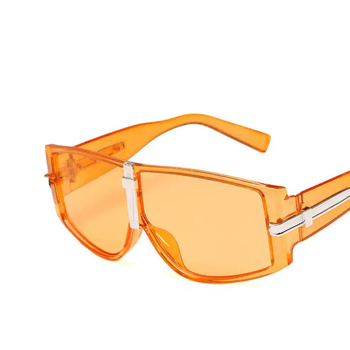 Orange Sonnenbrille mit silbernen Akzenten, modernes Design, Damenmode bei IsabellBoutique030.