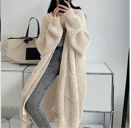 Langer Damen-Strickcardigan für Herbst und Winter – locker geschnitten, vielseitig kombinierbar, mit langen Ärmeln - Damenmode online kaufen | Isabell Boutique