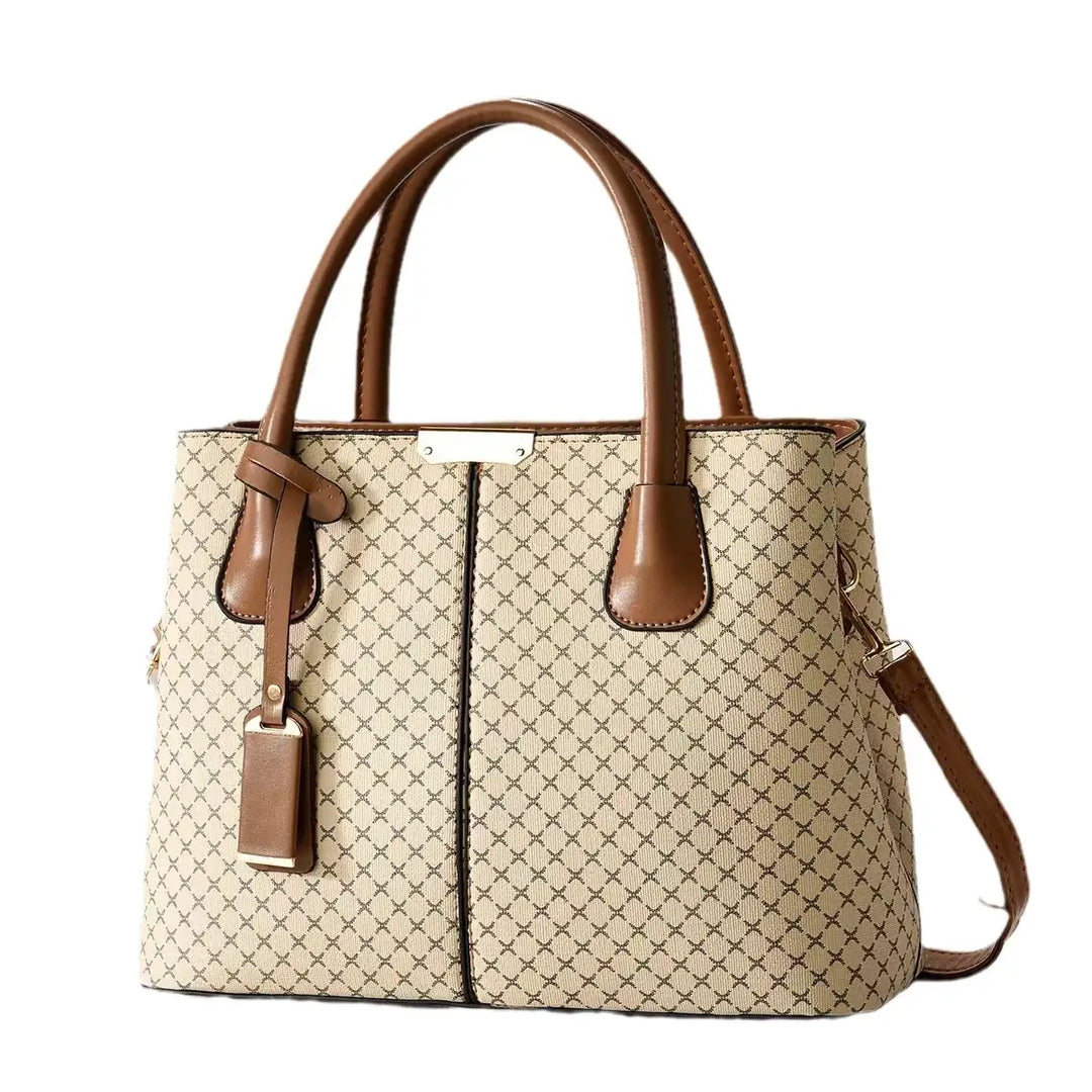 Beigefarbene Handtasche mit braunen Henkeln und Muster, elegantes Accessoire. IsabellBoutique030