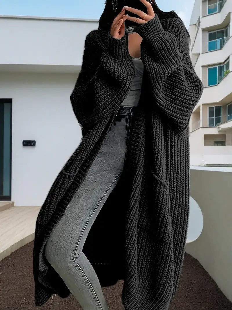 Langer Damen-Strickcardigan für Herbst und Winter – locker geschnitten, vielseitig kombinierbar, mit langen Ärmeln - Damenmode online kaufen | Isabell Boutique