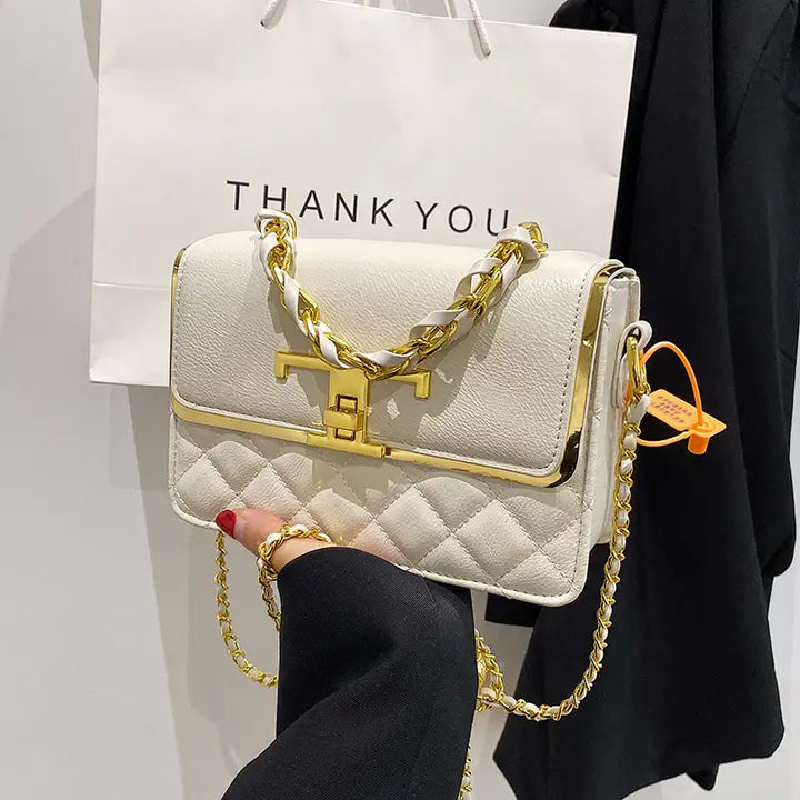 Handtasche mit Diamantkette – Elegante und Stilvolle Schultertasche - Damenmode online kaufen | Isabell Boutique