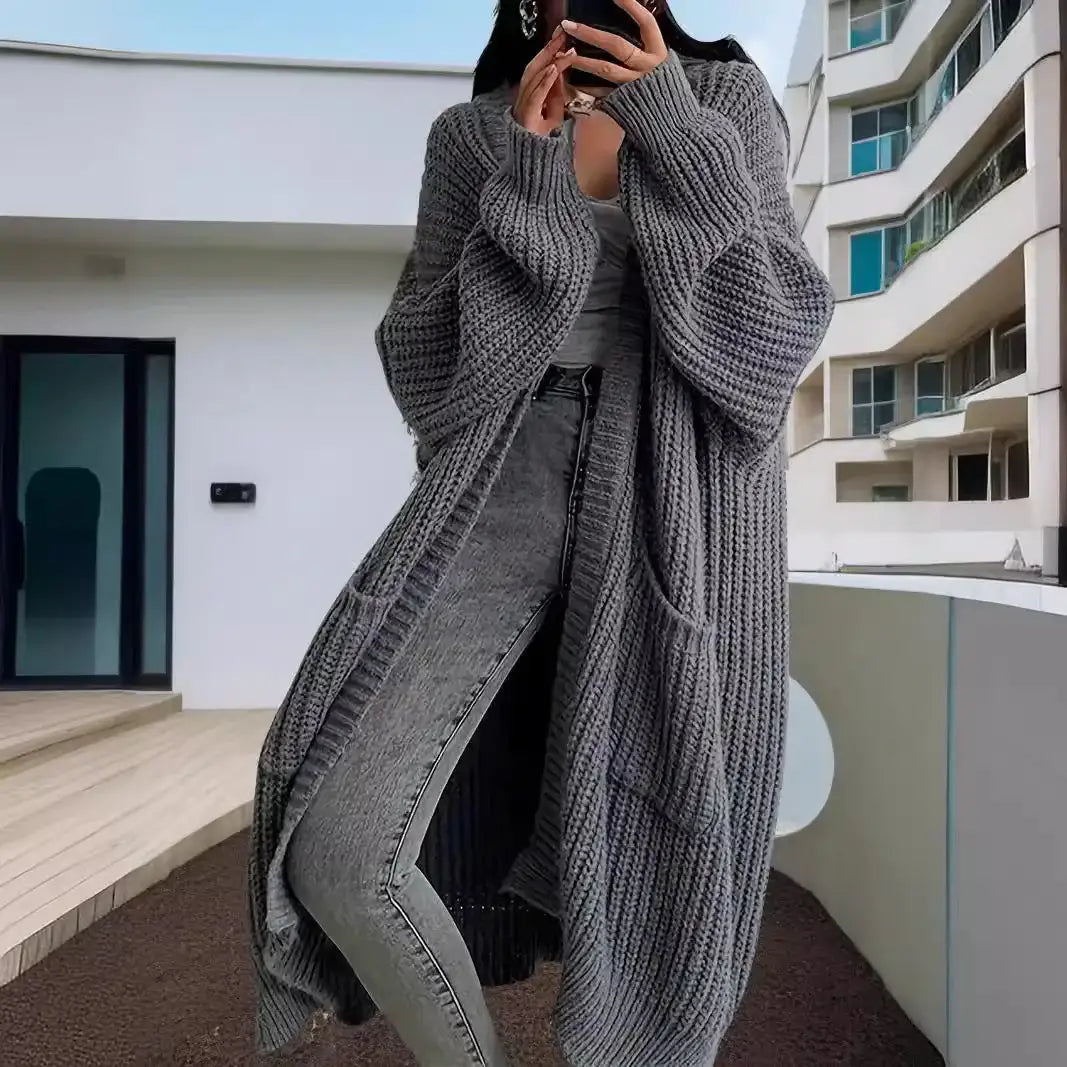 Langer Damen-Strickcardigan für Herbst und Winter – locker geschnitten, vielseitig kombinierbar, mit langen Ärmeln - Damenmode online kaufen | Isabell Boutique
