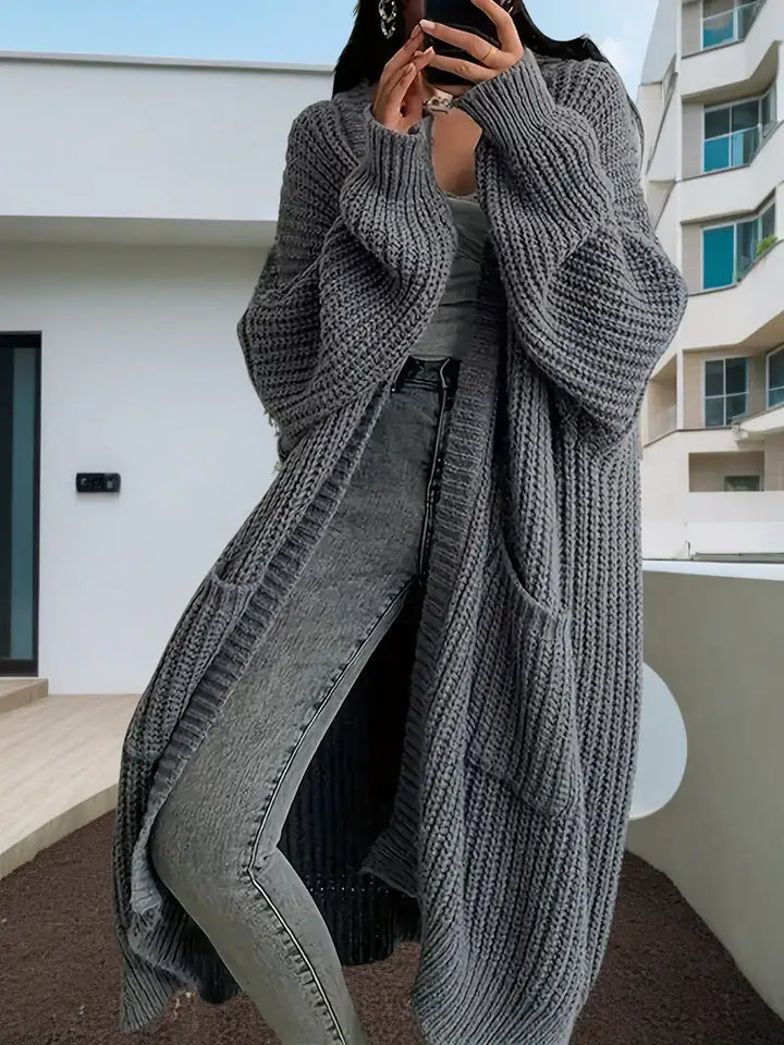 Langer Damen-Strickcardigan für Herbst und Winter – locker geschnitten, vielseitig kombinierbar, mit langen Ärmeln - Damenmode online kaufen | Isabell Boutique