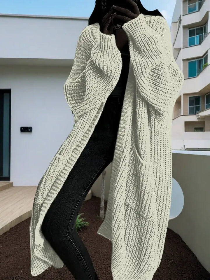 Langer Damen-Strickcardigan für Herbst und Winter – locker geschnitten, vielseitig kombinierbar, mit langen Ärmeln - Damenmode online kaufen | Isabell Boutique
